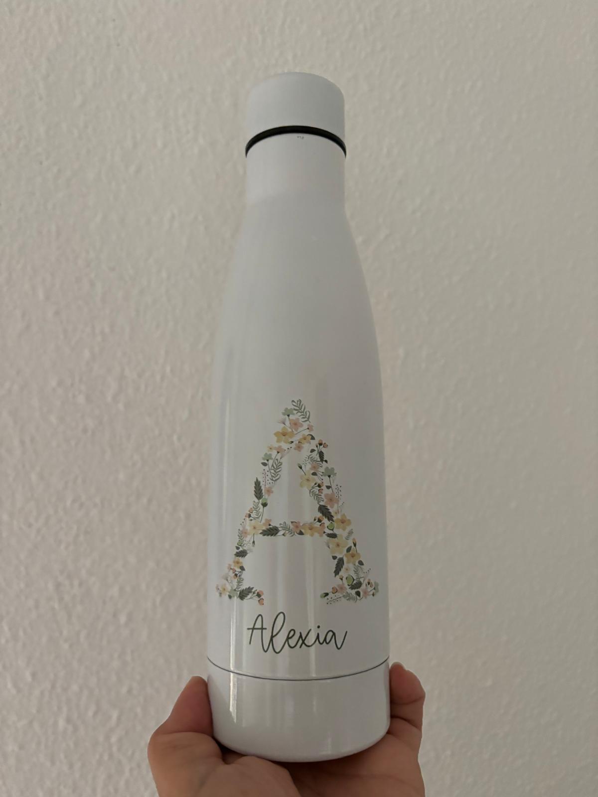 Botella inicial flores